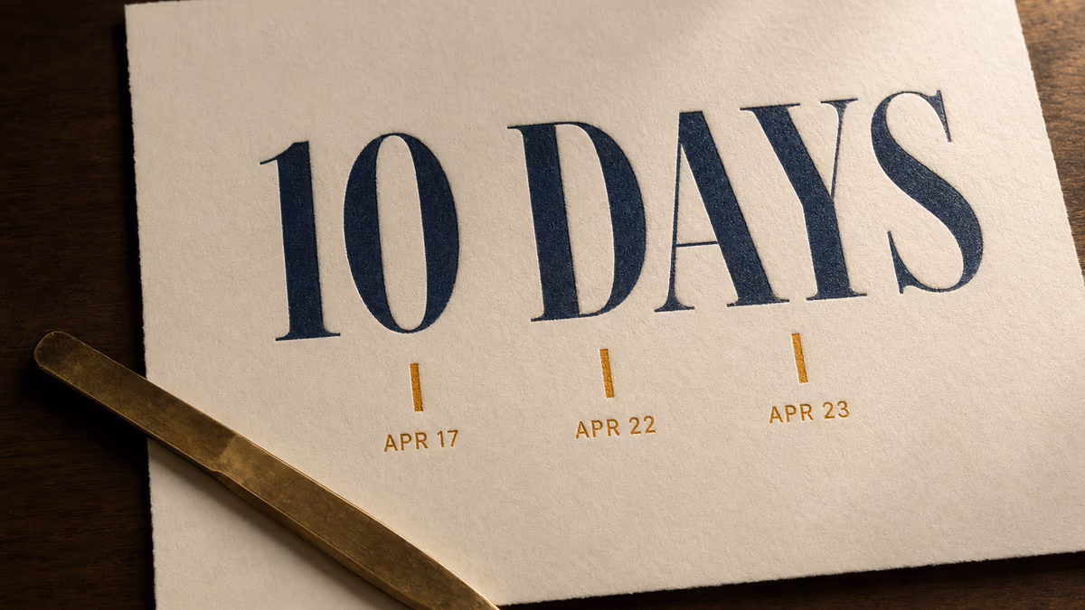 Letterpress-style sheet of cream paper with deep navy serif text reading '10 DAYS' above three amber tally marks labeled APR 17, APR 22, APR 23, with a brass paper-knife resting on the lower-left corner.