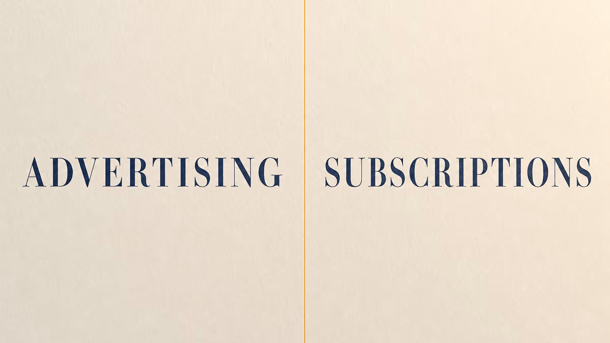 All-caps editorial-serif words ADVERTISING and SUBSCRIPTIONS divided by a vertical amber line on warm ivory background.